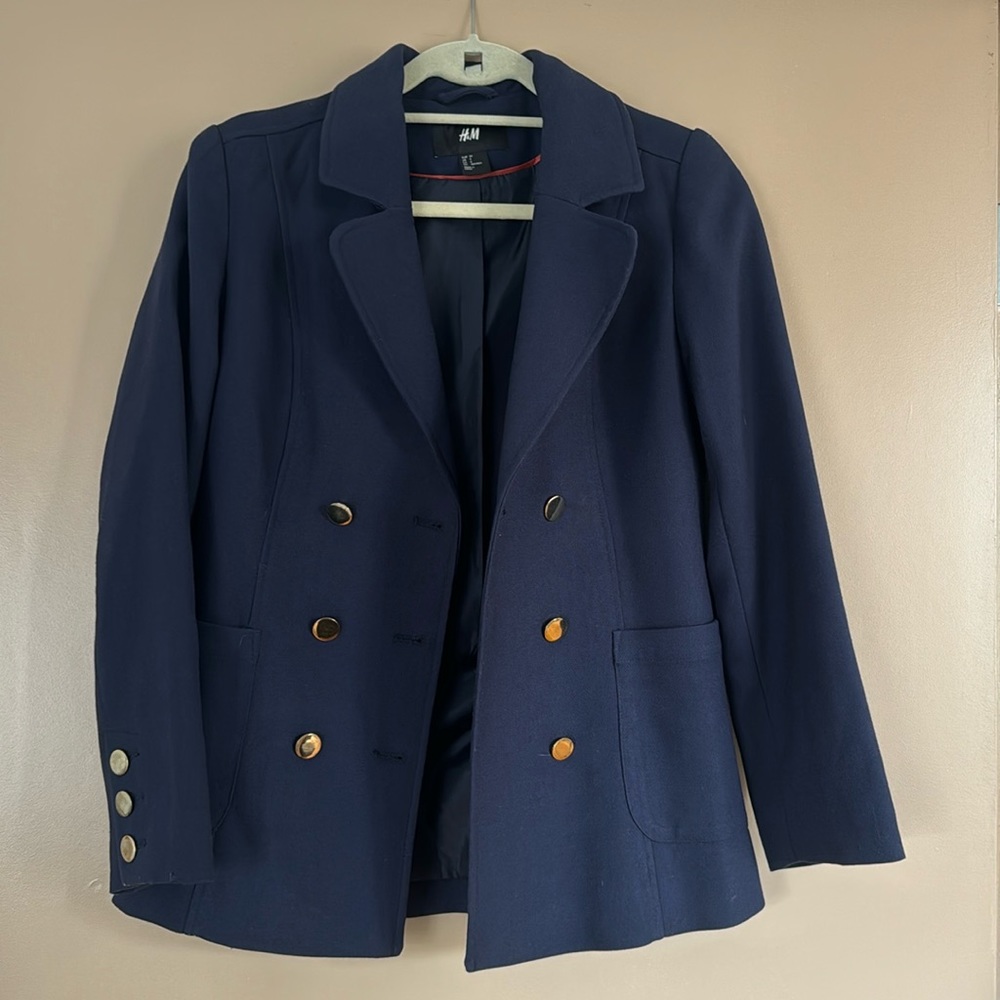 Blue blazer with gold accent buttons